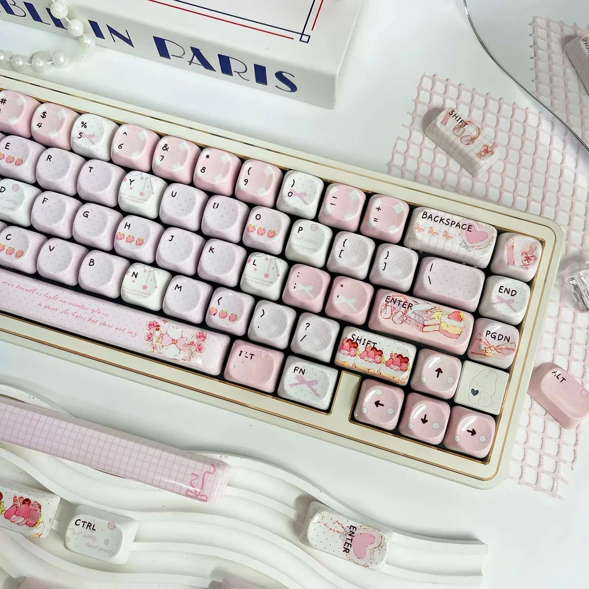 A collection of Gentle Landing MOA PBT keycaps showcasing their serene glazed aesthetic and unique profile from various angles.
