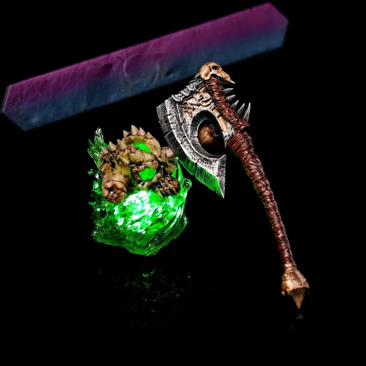 Artisan WoW Gorehowl Keycap, showcasing its iconic rugged design, intricate craftsmanship, and magnetic detachable axe from a captivating angle.