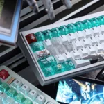 Premium Gundam Unicorn PBT+PC keycap set, presented from multiple angles, highlighting its futuristic translucent design and refractive light effects.