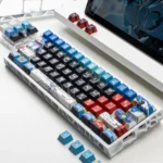 Iconic XXXG-00W0 Wing Gundam Zero backlit PBT keycaps set, captured from a unique angle, highlighting its futuristic mecha design and luminous Wing Zero detail.