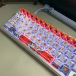 Exclusive Gundam Kyrios translucent PBT mecha keycap set, showcasing its premium futuristic design, intricate detailing, and captivating lighting effect.