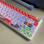 Exclusive Gundam Kyrios translucent PBT mecha keycap set. View intricate futuristic design details and captivating lighting effects from multiple angles.