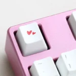 Charming dual-heart PBT keycap with vibrant dye-sublimated graphics. Highlights durable PBT texture and clean lines. A premium heart PBT keycap.