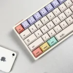 Playful Hello World PBT dye-sub keycaps from the Minty Fresh Set, showcased from various angles highlighting their crisp retro-tech design.