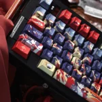 Official Honkai Star Rail Mortenax Blade artisan keycap. Dark, sleek, high-tech design shown from multiple angles, highlighting premium craftsmanship.