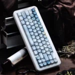 Close-up of the Jade Marble PBT Keycaps Set, highlighting its elegant jade-like texture and ergonomic MOA profile from various angles for a sophistic.