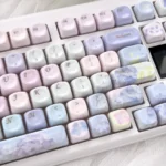 Close-up of luxurious Endless Summer Jade MOA Keycaps set in a serene purple floral design, showcasing their smooth jade-like finish and artistic craftsmanship design.