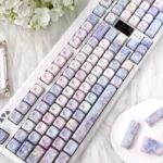 Luxurious Endless Summer Jade MOA Keycap Set with purple floral designs, showcasing their smooth jade-like finish from various angles in a serene aesthetics design.