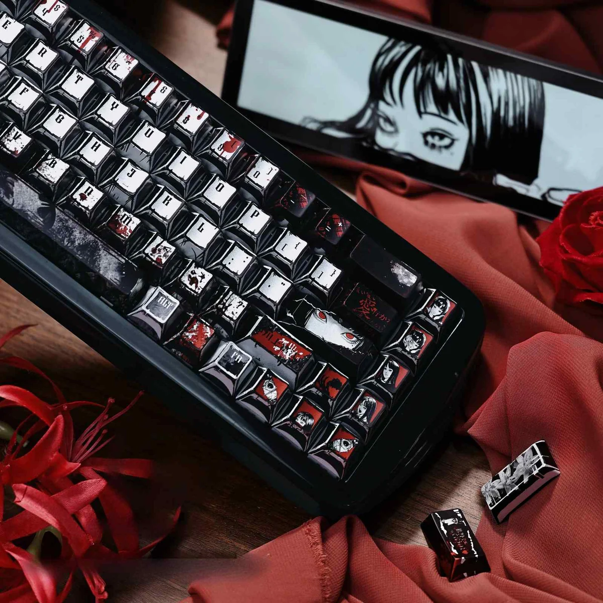 Junji Ito Tomie Metallic PBT Keycap Set, captured from multiple angles, highlighting Tomie's eerie artwork and the distinct, durable metallic finish.