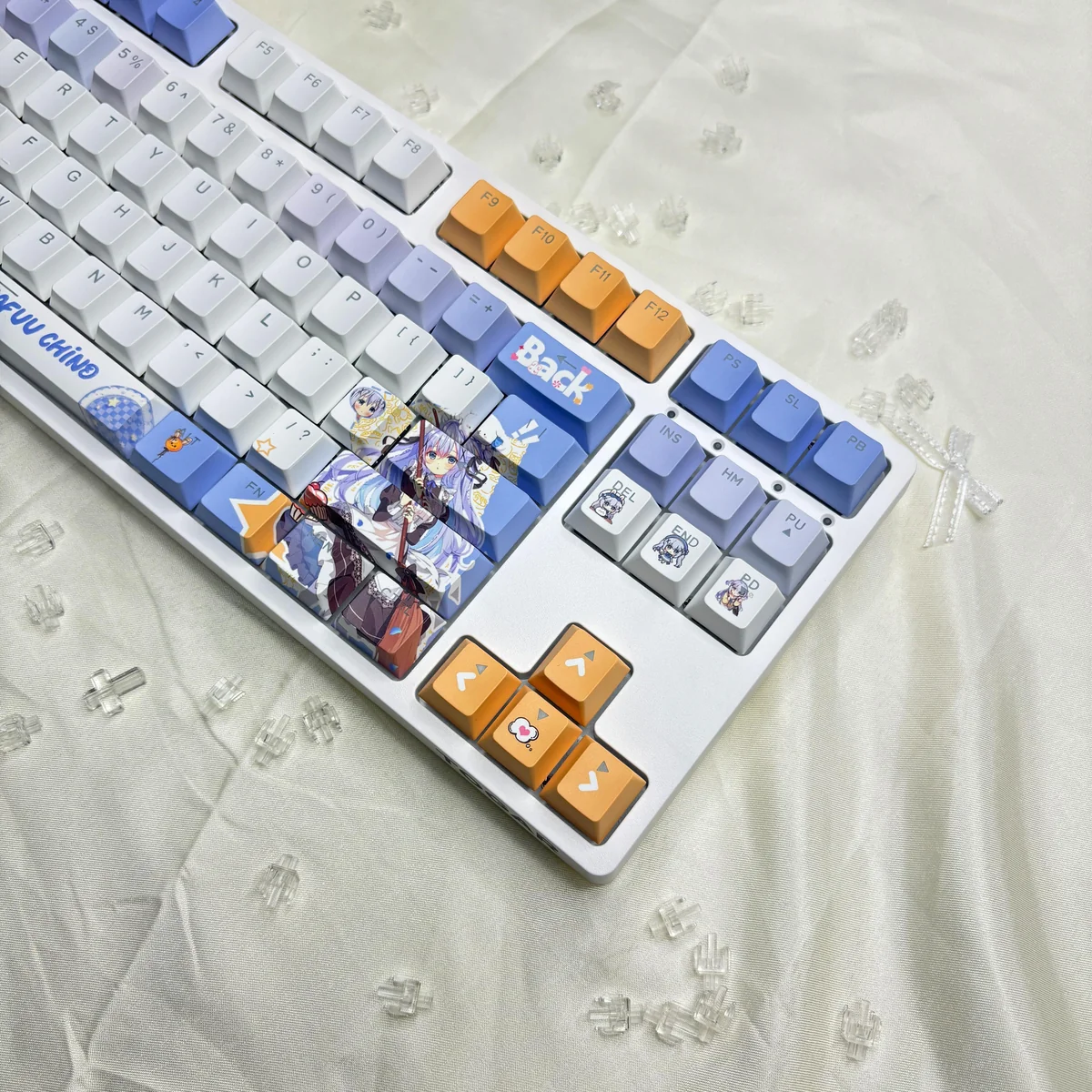 Adorable Chino Kafu PBT keycaps from Is the Order a Rabbit anime, showcasing crisp dye-sub legends and design for beautiful backlighting.
