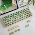 A gallery of whimsical Le Petit Prince PBT MOA keycaps from various angles, highlighting the charming storybook prairie prince design with cute nature element.