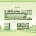 Whimsical Matcha Totoro PBT Keycap Set displayed on a keyboard, featuring charming Totoro characters, calming matcha green, and soft forest hues.