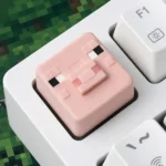 Discover these vibrant handcrafted Minecraft animal resin keycaps, featuring charming pixelated designs and blocky texture from a fresh angle.