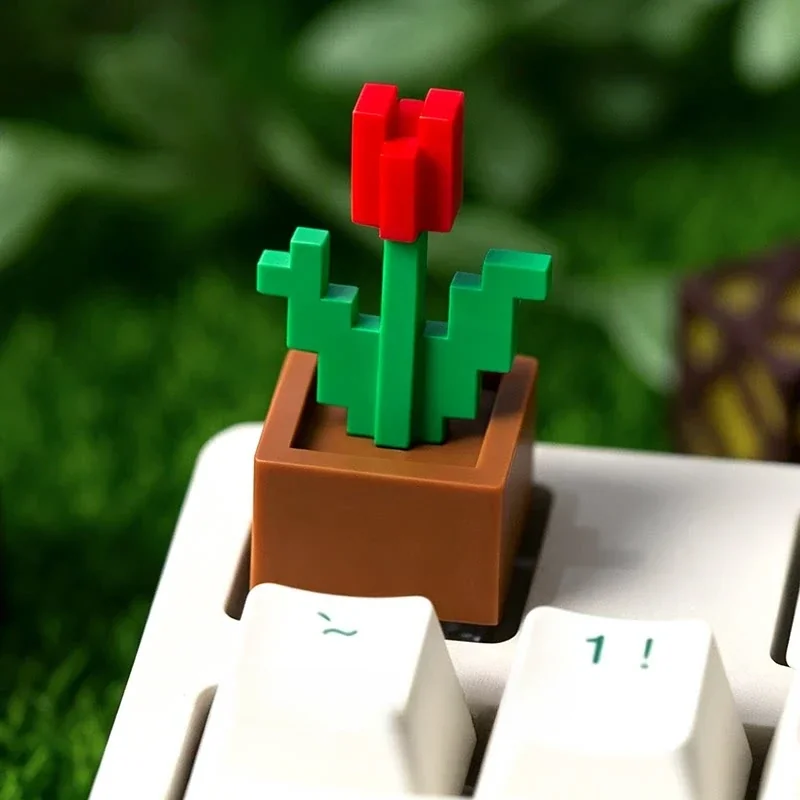 Multiple angles of the playful Minecraft Tulip artisan keycap, showcasing its vibrant pixel art and nature-inspired design for a unique keyboard.