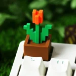 Explore this iconic Minecraft Tulip artisan keycap from playful angles, showcasing its vibrant pixel art and charming nature-inspired design.