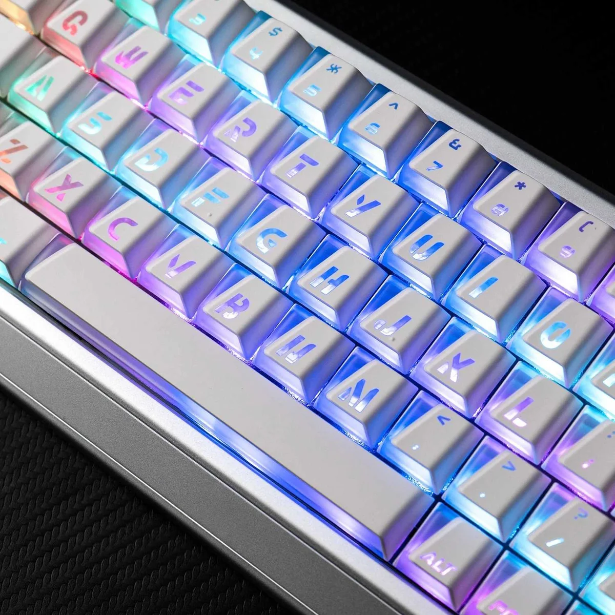 Close-up of Vibrant Minimalist Prism Cherry Keycap Set, showcasing multiple angles and their modern aesthetic with vibrant light refraction angles.