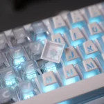 Vibrant Minimalist Prism Cherry Keycaps, multiple angles reveal crisp luminous legends, modern aesthetic, and dazzling light refraction.