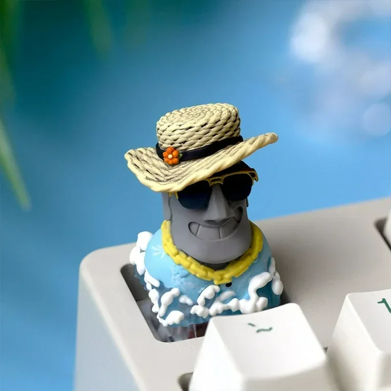 Handcrafted resin Easter Island Moai artisan keycap, featuring a detailed sculptural Moai figure, evoking ancient mystery for your mechanical keyboard.