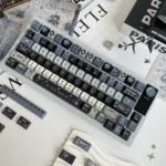 A close-up view of the Romantic Night Weaving PBT Dye-sub Keycap Set, showcasing its dark, enchanting celestial patterns from a unique angle, perfect finish.