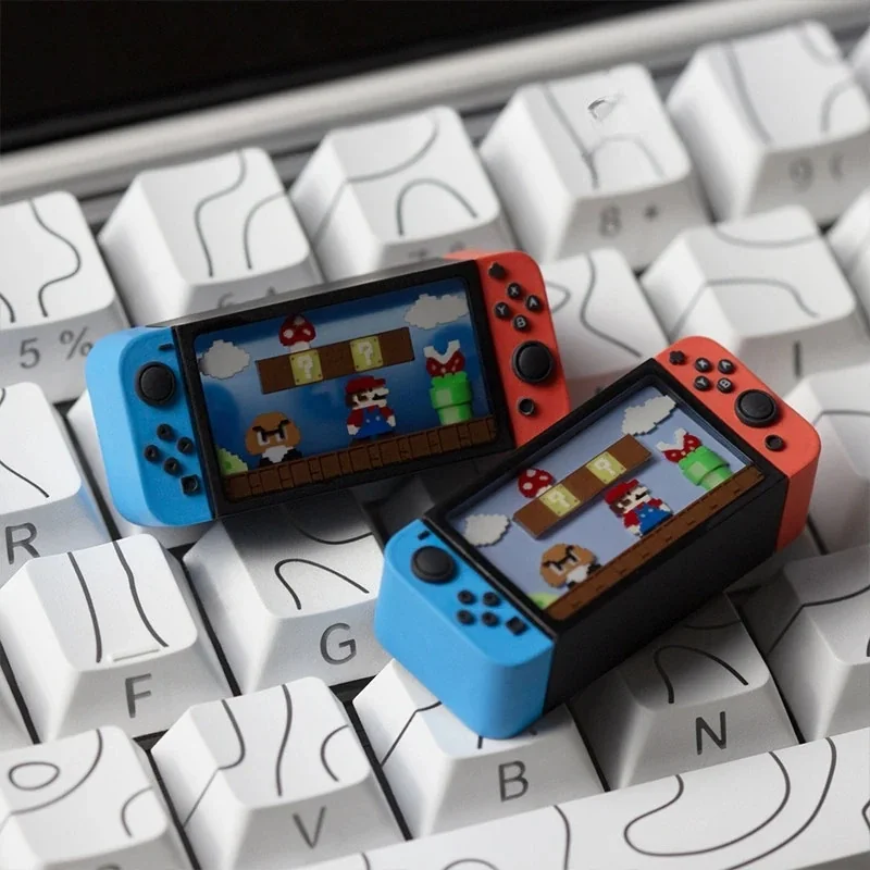 Playful, iconic Nintendo Switch Series Super Mario keycap for gaming keyboards, featuring a miniature and detailed console design that brings a unique touch to your set up.