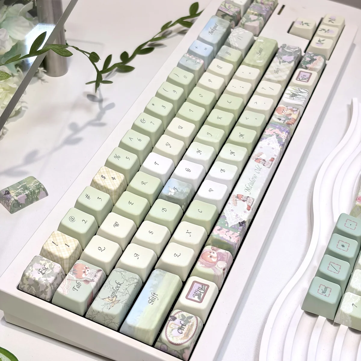 Meadow Ode Luminous Side-Lit PBT Keycap Set. Gallery shows nature-inspired designs, luminous glow, refined textures, artisanal detail.
