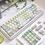 Meadow Ode Luminous Side-Lit PBT Keycap Set. Multiple angles reveal nature-inspired designs, soft luminous glow, and refined PBT texture.