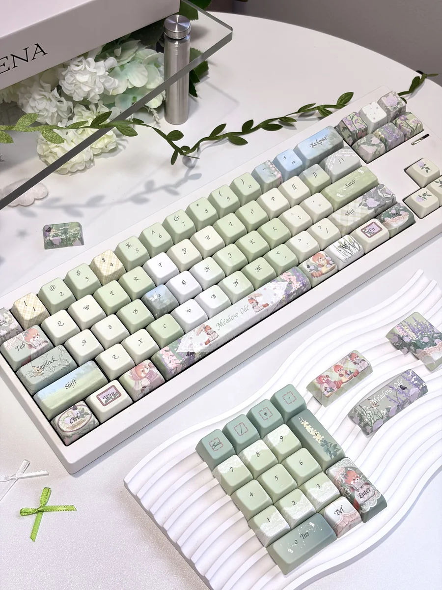 Meadow Ode 134-key MDA PBT keycap set, showcasing its luminous, nature-inspired, side-lit design. Refined textures and soft glow evoke tranquil.