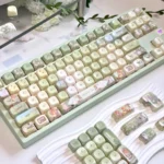 Meadow Ode Luminous Side-Lit PBT keycap set, Jade Edition, showcasing its refined, smooth texture and tranquil, nature-inspired luminous glow.