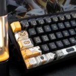 Close-up of Cosmic Portal backlit PBT keycaps, highlighting their durable texture and vibrant interstellar backlighting on a mechanical keyboard.