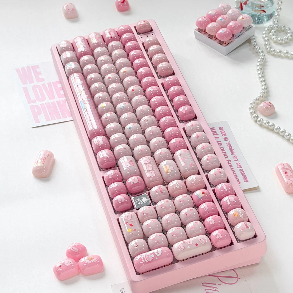 Close-up of a playful pig gummy MOG keycap, showcasing its adorable pastel design and unique rounded profile from a charming angle.