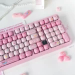 Playful pig gummy MOG keycaps, featuring an adorable pastel design on an RS108 keyboard with Moon White switches, perfectly embodies a whimsical candy design.