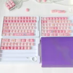 Playful Pig Gummy MOG keycaps in a sweet pastel palette, adorning an MX keyboard with a moon white aesthetic, emphasizing their unique profile.
