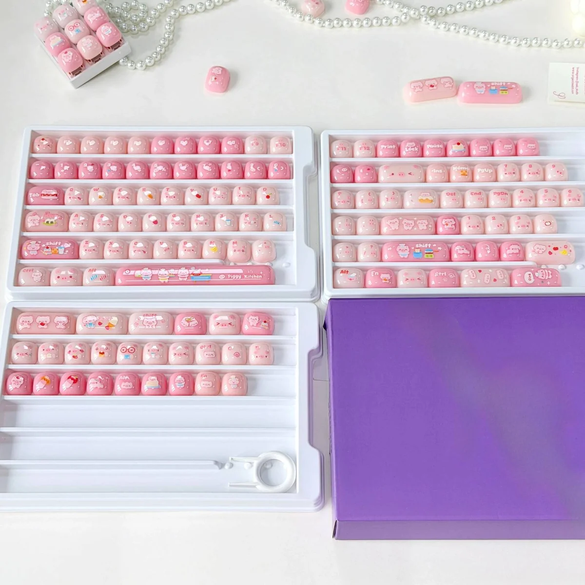 Playful Pig Gummy MOG keycaps in a sweet pastel palette, adorning an MX keyboard with a moon white aesthetic, emphasizing their unique profile.