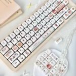 Adorable pink bear MOA profile keycaps set, showcasing their unique jade-like texture and soft pink hues from a delightful angle.