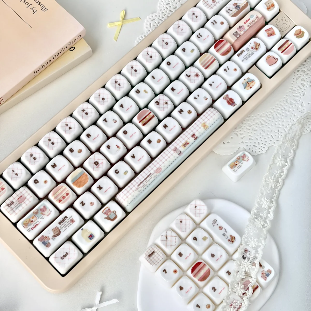 Adorable Pink Bear Keycap Set featuring a unique, smooth jade-like texture and playful design in soft pink hues for a charming keyboard look.