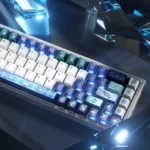 Close-up of a PBT Prism Keycap Set, showcasing its mesmerizing light refraction and vibrant spectrum colors on a modern keyboard.