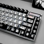 A close-up of the unique Prometheus PBT Keycaps, showcasing their premium metallic dye-sub finish and dark, mystical industrial design.