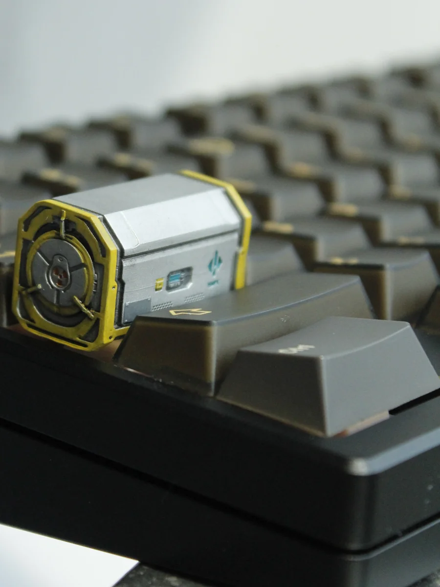Detailed views of the handcrafted Radioactive Scrap Box keycap, showcasing its gritty, post-apocalyptic resin barrel design from multiple angles。