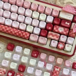 Detail view of the Whimsical Raspberry Diary PBT MOA keycap set, revealing sweet pastel raspberry and charming diary motifs on the uniform MOA profile.