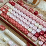 This Whimsical Raspberry Diary PBT MOA keycaps set showcases sweet pastel hues and playful raspberry and diary-themed art on its uniform profile.