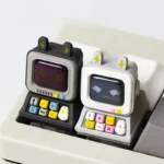 Retro Desktop Computer Artisan Keycaps featuring an intricate miniature retro desktop computer design with a glowing backlight.