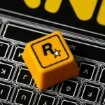 A playful close-up of the iconic Rockstar Games resin ESC keycap, highlighting its bold R* logo and sleek, custom gaming aesthetic from an engaging design.