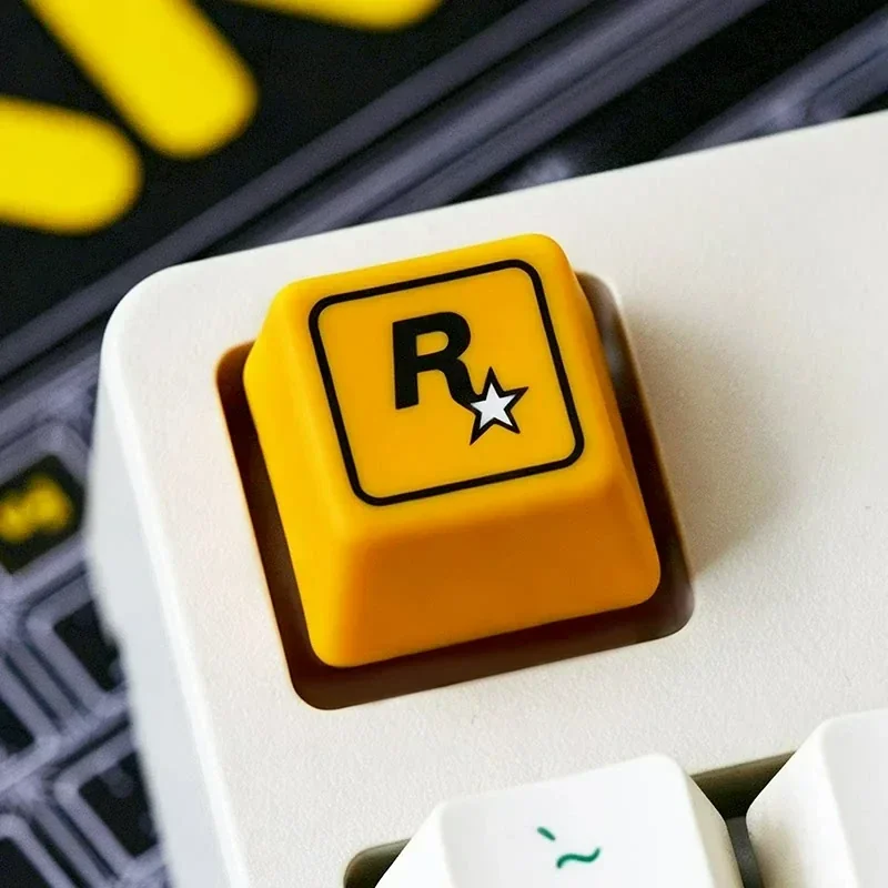 Bold Rockstar Games resin ESC keycap featuring the iconic R* logo. A playful, custom gaming accent for any setup, perfect for fans.