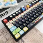 A playful, vibrant Roco Kingdom MOA PBT dye-sub keycap set, showcasing charming characters from various angles, celebrating its exclusive.