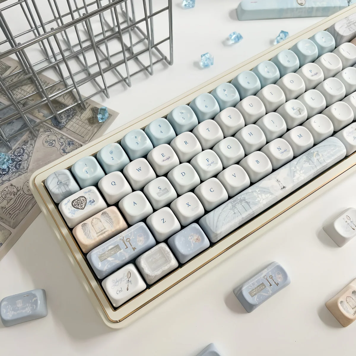 Close-up of Sacred Feather Prayer MOA Keycap Set, highlighting ethereal feather motifs and soft celestial accents. A peaceful, artistic keyboard aesthetic.