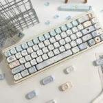 Sacred Feather Prayer MOA Keycap Set collection, featuring delicate feather motifs and celestial accents in soft, ethereal colors, creating a peaceful keyboard.