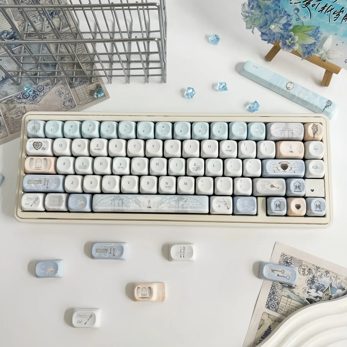 Sacred Feather Prayer MOA Keycap Set, an Ethereal MOA Dye-Sub Set, showcasing delicate feather motifs and soft celestial tones for a serene, artistic keyboard.