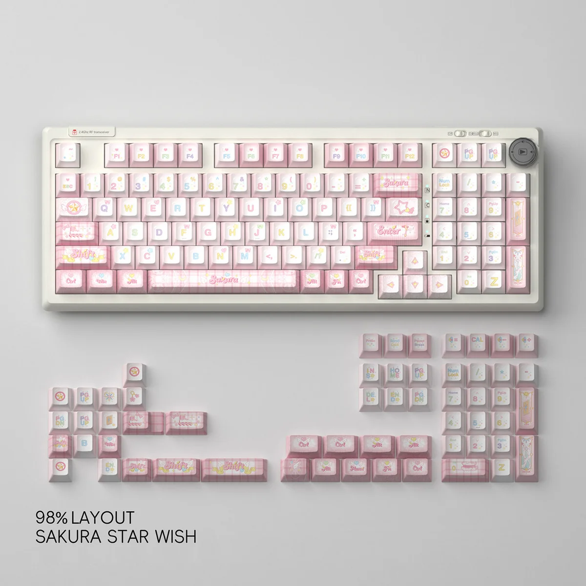 Sakura Star Wish PBT keycap set detail, highlighting soft pink dye-sublimated blossoms and twinkling stars for a dreamy, elegant desktop.