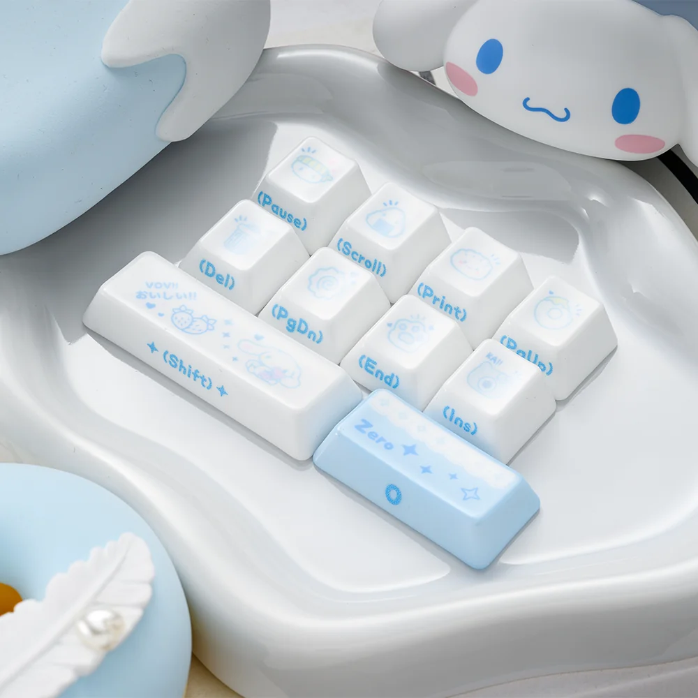 Premium ceramic Cinnamoroll keycaps, lustrous and artistic, displayed from multiple angles. Features whimsical side-engraved art and soft vibrant color.