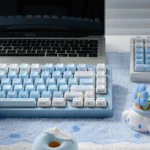 Explore premium ceramic Cinnamoroll side-engraved keycaps from various artistic angles, highlighting their lustrous finish, whimsical art, and soft vibrant color.